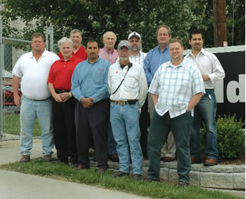 Some members of the Fieldale Farms processing team. In the back row left to right are Greg Stenzel, Claude Sullens, Bud Hill, Stephen Gray, and Villanel Garcia. In the front row left to right are Bryan Spears, Dan White, Raul Pena, Randy Williams, and Blake Wikle.